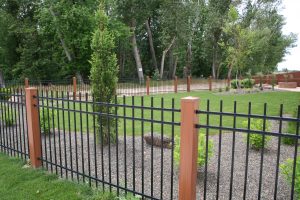Mocha Walnut vinyl and black metal fence