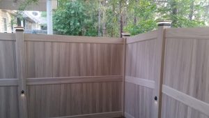 taupe colored fence with lights