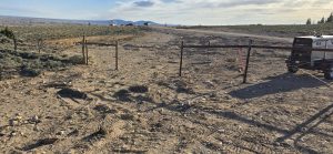 Barbed Wire fence around range land
